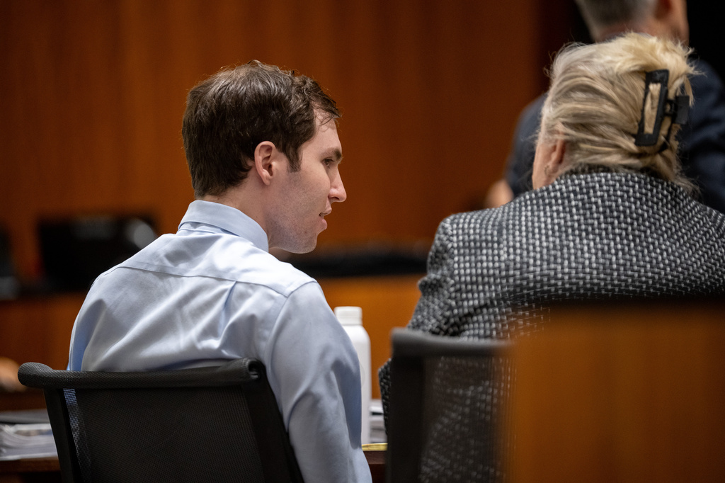 Tyler Robinson, left, speaks with his attorney Kathryn Nester in 4th District Court in Provo, Utah, on Friday, April 17, 2026. (Trent Nelson/The Salt Lake Tribune via AP, Pool)