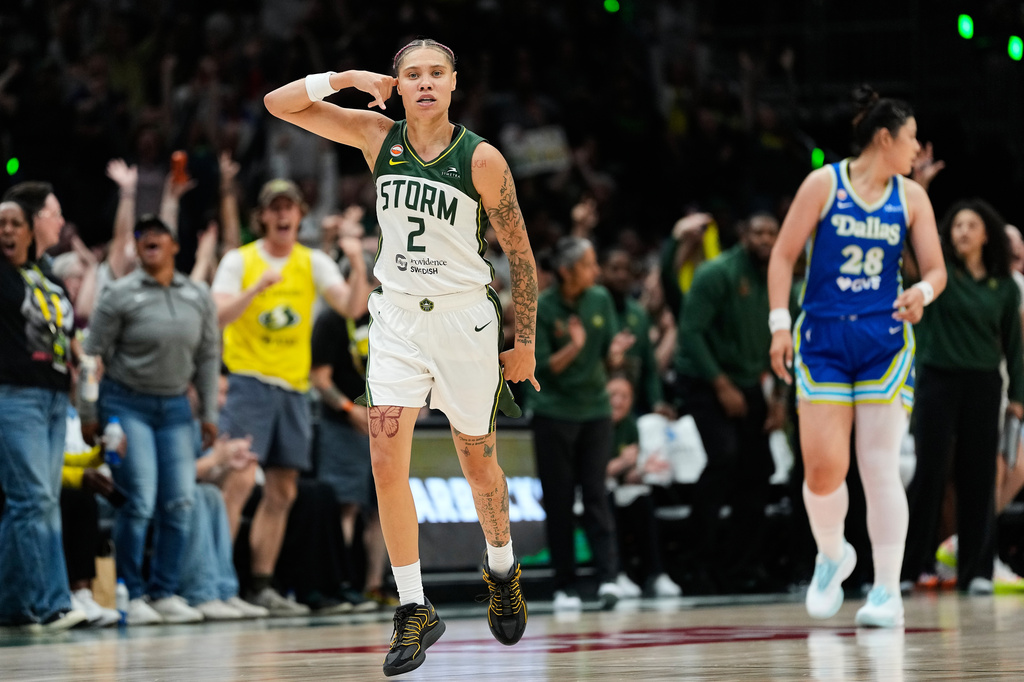Seattle Storm guard Natisha Hiedeman (2) reacts after a basket against the Dallas Wings during the second half of a WNBA basketball game, Monday, June 22, 2026, in Seattle. (AP Photo/Lindsey Wasson)