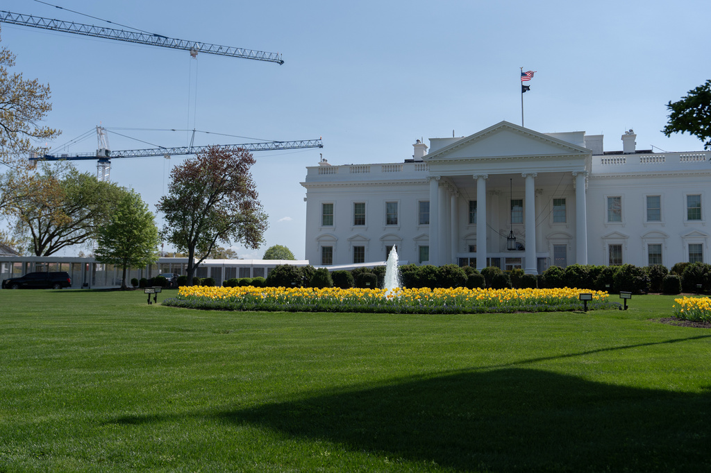Cranes being used to construct the new White House ballroom are seen around the White House, Saturday, April 4, 2026, in Washington. (AP Photo/Julia Demaree Nikhinson)