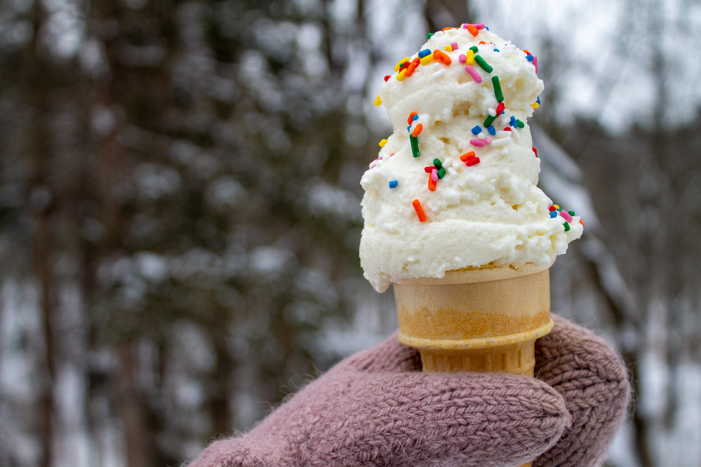 A cone of snow cream, made by mixing sweetened condensed milk with fresh snow, is seen Tuesday, Jan. 27, 2026, in Bow, N.H. (AP Photo/Holly Ramer)