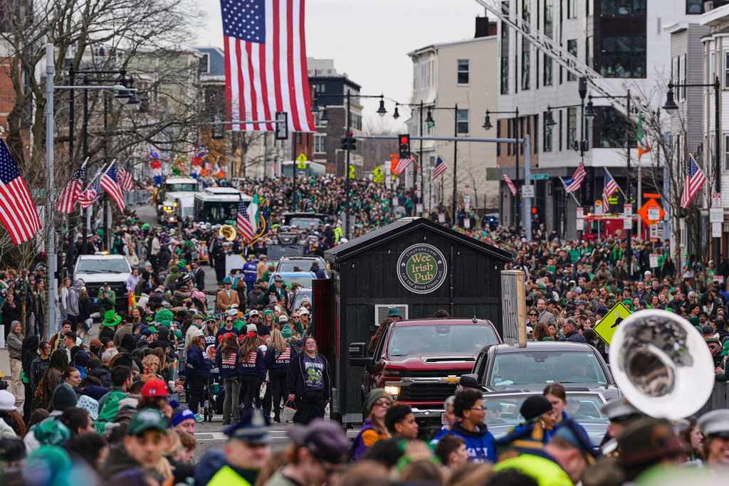 The "Wee Irish Pub", a fully functioning mobile Irish pub built by two Massachusetts' brothers, is towed down Dorchester Avenue during the annual St. Patrick's Day parade through the South Boston neighborhood, Sunday, March 15, 2026. (AP Photo/Charles Krupa)