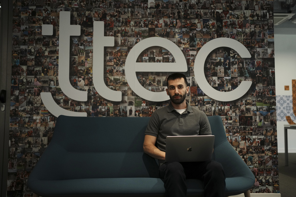 Armen Kirakosian, Global Senior Manager, Learning & Development TTEC poses in Athens, Greece, Thursday, Aug. 21, 2025. (AP Photo/Thanassis Stavrakis)