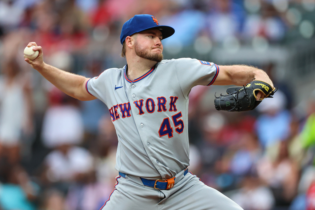 New York Mets pitcher Christian Scott delivers in the first inning of a baseball game against the Atlanta Braves, Friday, July 3, 2026, in Atlanta. (AP Photo/Colin Hubbard)