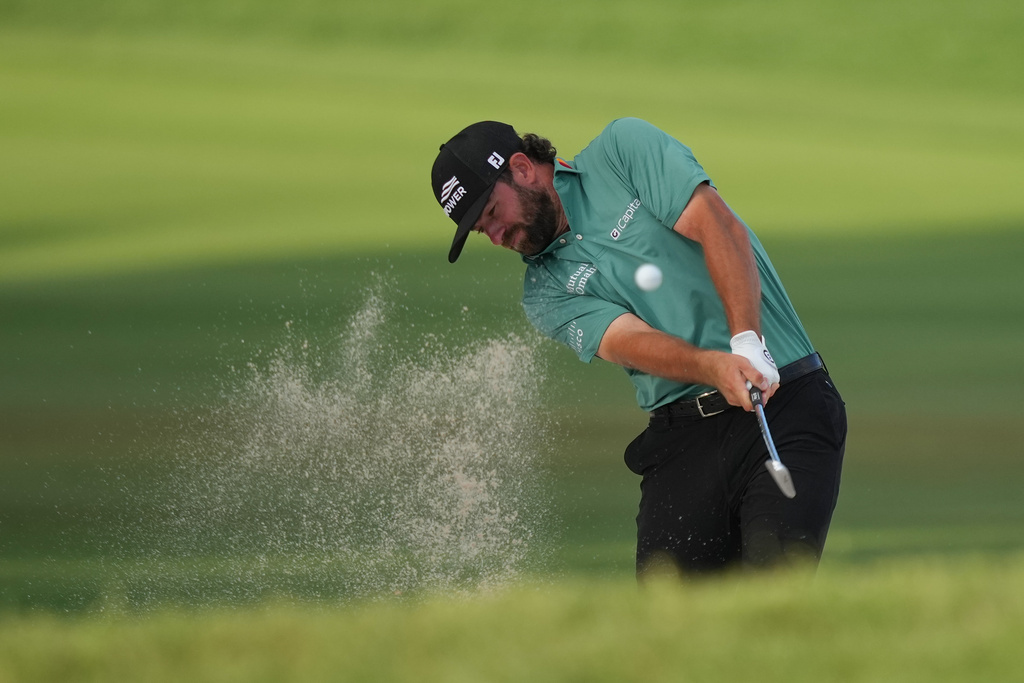 Cameron Young hits on the 16th hole during the third round of the Arnold Palmer Invitational at Bay Hill golf tournament Saturday, March 7, 2026, in Orlando, Fla. (AP Photo/Matt Slocum)