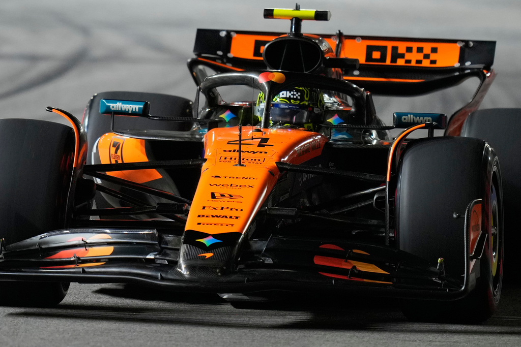 McLaren driver Lando Norris of Britain steers his car during the second practice session of the Singapore Formula One Grand Prix at the Marina Bay Street Circuit in Singapore, Friday, Oct. 3, 2025. (AP Photo/Vincent Thian)