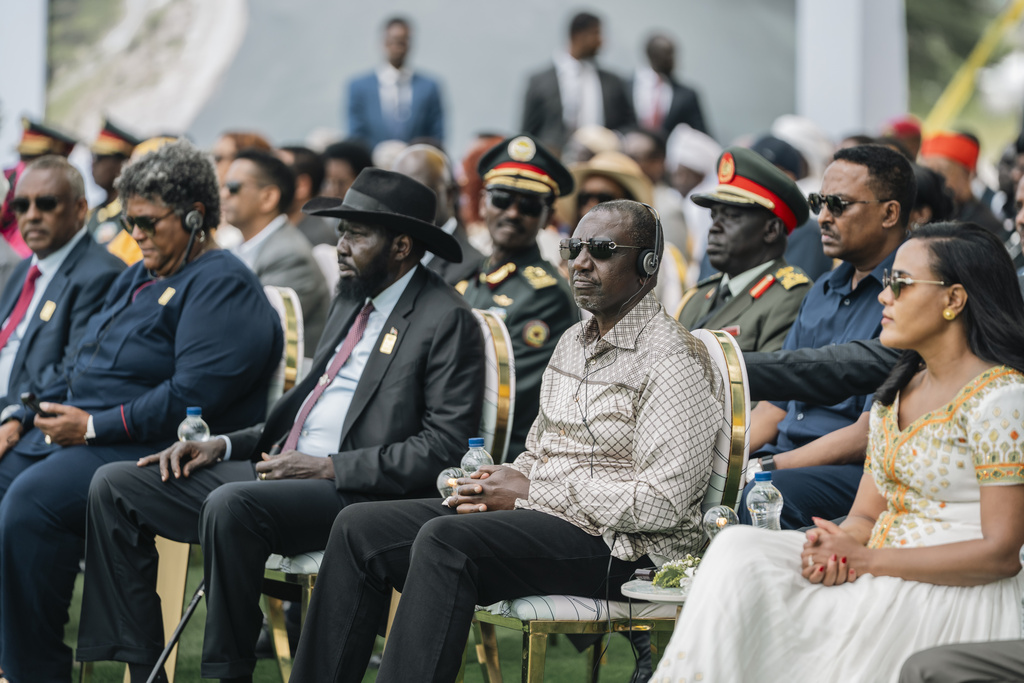 Kenya's President William Ruto, second right, listens to a speech during the inauguration of the Grand Ethiopian Renaissance Dam in Benishangul-Gumuz, Ethiopia, Tuesday, Sept. 9, 2025. (AP Photo)