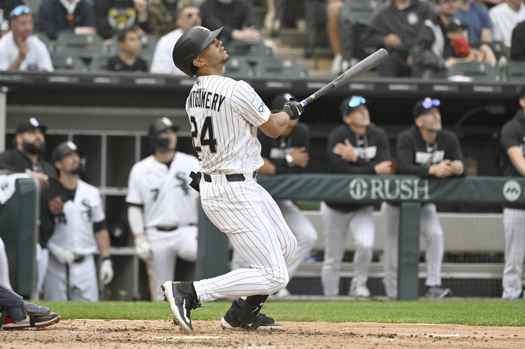 Chicago White Sox's Braden Montgomery hits a one-run sacrifice fly ball during the seventh inning of a baseball game against the Cleveland Guardians, Wednesday, June 24, 2026, in Chicago. (AP Photo/Matt Marton)