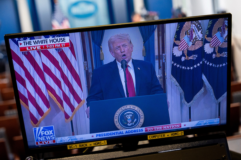 President Donald Trump is seen speaking about the Iran war on a television screen in the James Brady Press Briefing Room of the White House, Wednesday, April 1, 2026, in Washington. (AP Photo/Julia Demaree Nikhinson)