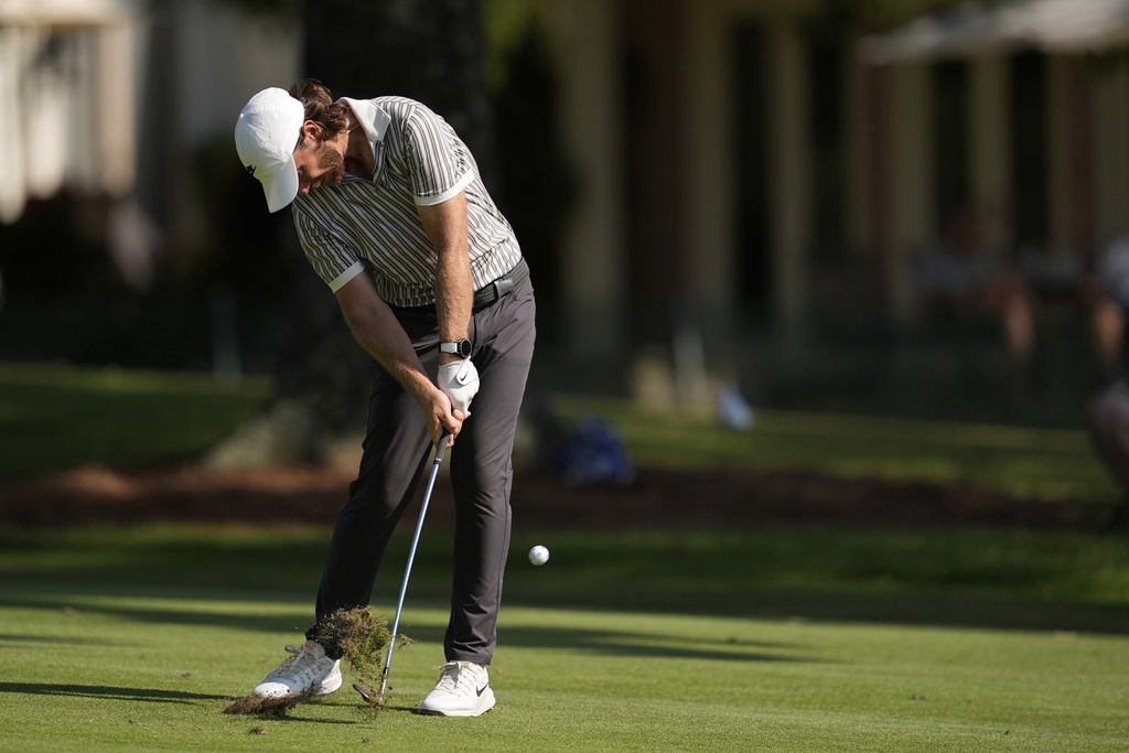 Tommy Fleetwood, of England, hits on the 17th hole during the first round of the St. Jude Championship golf tournament Thursday, Aug. 7, 2025, in Memphis, Tenn. (AP Photo/George Walker IV)