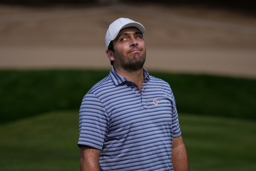 Francesco Molinari of Italy reacts after missing a putt on the 3rd hole during second round of the Dubai Desert Classic in United Arab Emirates, Friday, Jan. 23, 2026. (AP Photo/Altaf Qadri)