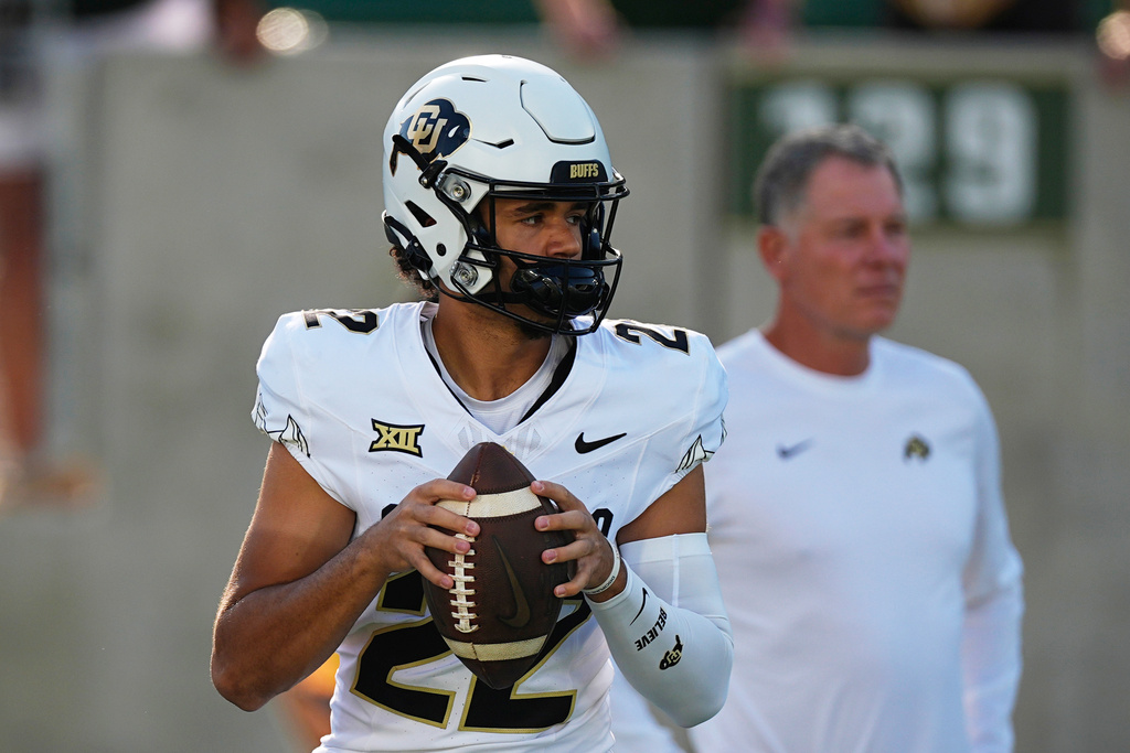 FILE - Colorado quarterback Dominiq Ponder (22) warms up before an NCAA college football game Sept. 14, 2024, in Fort Collins, Colo. (AP Photo/David Zalubowski, File)