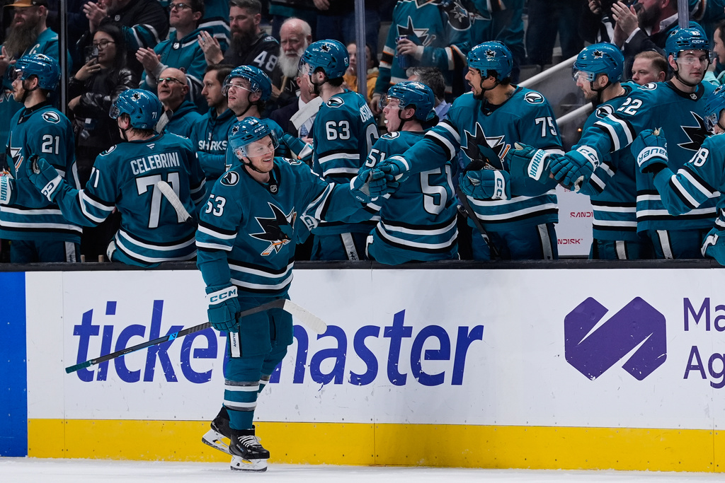 San Jose Sharks left wing Jeff Skinner (53) celebrates with teammates after scoring a goal during the second period of an NHL hockey game against the Dallas Stars, Saturday, Jan. 10, 2026, in San Jose, Calif. (AP Photo/Godofredo A. Vásquez)