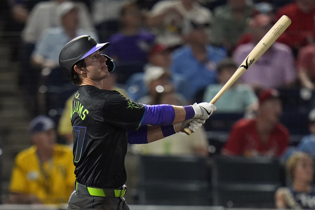 Tampa Bay Rays' Carson Williams watches his two-run home run off St. Louis Cardinals pitcher Ryan Fernandez during the seventh inning of a baseball game Friday, Aug. 22, 2025, in Tampa, Fla. (AP Photo/Chris O'Meara)