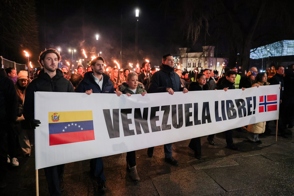People attend a rally by the Norwegian Venezuelan Justice Alliance in honor of Nobel Peace Prize laureate Maria Corina Machado in Oslo, Wednesday, Dec. 10, 2025. (Amanda Pedersen Giske/NTB Scanpix via AP)