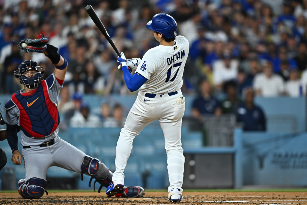 Los Angeles Dodgers' Shohei Ohtani (17) takes a close pitch during the second inning of a baseball game against the St. Louis Cardinals, Wednesday, Sept. 2, 2026, in Los Angeles. (AP Photo/William Liang)