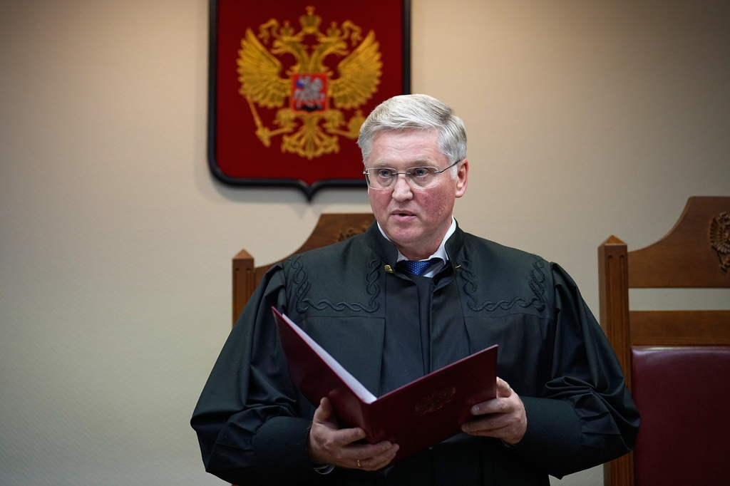 Court judge Vyacheslav Kirillov reads a ruling to outlaw the "international movement" Memorial as extremist in a move against Nobel Peace Prize-winning rights group in Moscow, Russia, Thursday, April 9, 2026. (AP Photo/Alexander Zemlianichenko)