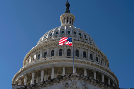 The American flag flies over the Capitol in Washington, on the ninth day of the government shutdown, Thursday, Oct. 9, 2025. (AP Photo/J. Scott Applewhite) The American flag flies over the Capitol in Washington, on the ninth day of the government shutdown, Thursday, Oct. 9, 2025. (AP Photo/J. Scott Applewhite)