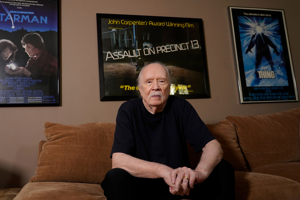 FILE - Author-filmmaker John Carpenter appears at his office in Los Angeles on Oct. 3, 2023. (AP Photo/Chris Pizzello, File)