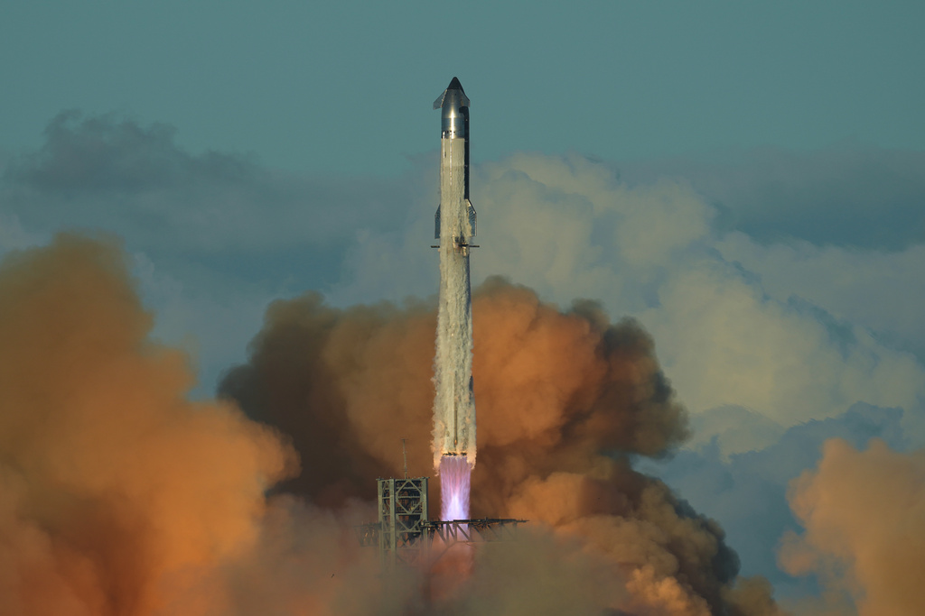 SpaceX's mega rocket Starship makes a test flight from Starbase, Texas, Monday, Oct. 13, 2025. (AP Photo/Eric Gay)