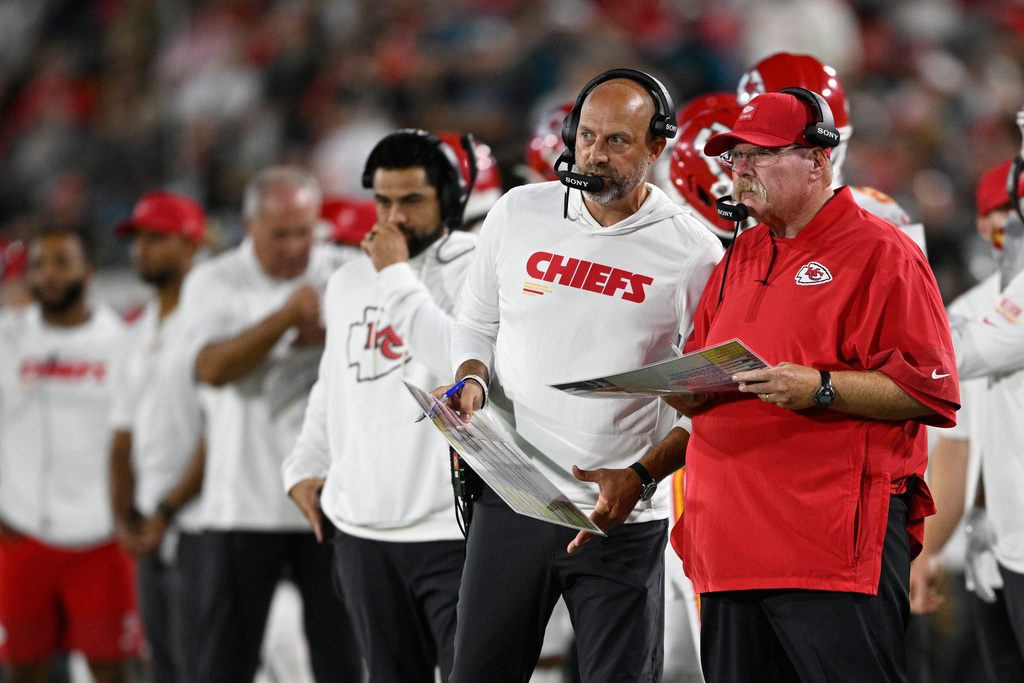 Kansas City Chiefs head coach Andy Reid and offensive coordinator Matt Nagy watch during the first half of an NFL football game against the Jacksonville Jaguars, Monday, Oct. 6, 2025, in Jacksonville, Fla. (AP Photo/Phelan M. Ebenhack)