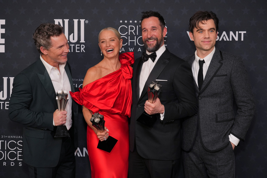 Shawn Hatosy, from left, Katherine LaNasa, winner of the award for best supporting actress in a drama for "The Pitt," Noah Wyle, winner of the award for best actor in a drama for "The Pitt," and Patrick Bell pose with the award for best drama series for "The Pitt" in the press room during the 31st Annual Critics Choice Awards on Sunday, Jan. 4, 2026, at The Barker Hanger in Santa Monica, Calif. (Photo by Jordan Strauss/Invision/AP)