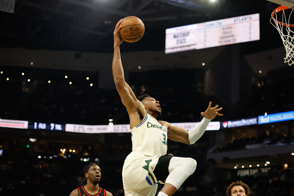 Milwaukee Bucks forward Giannis Antetokounmpo (34) dunks against the Atlanta Hawks during the first half of an NBA basketball game Wednesday, March 4, 2026, in Milwaukee. (AP Photo/Jeffrey Phelps)