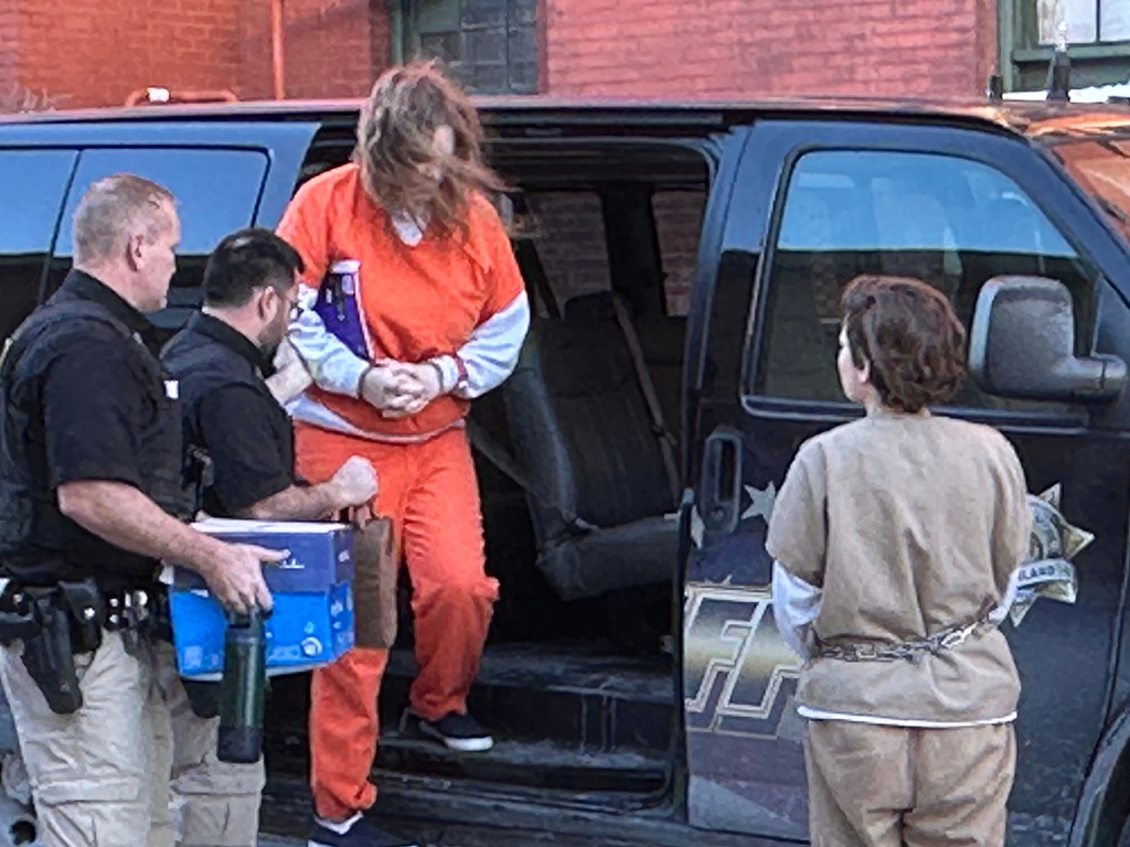 Defendants Michelle Zajko, right, and Jack "Ziz" LaSota arrive at the Alleghany County Courthouse in Cumberland, Md., for a pretrial hearing on trespassing, gun and drug charges on Friday, Jan. 30, 2026. (AP Photo/Mark Scolforo)