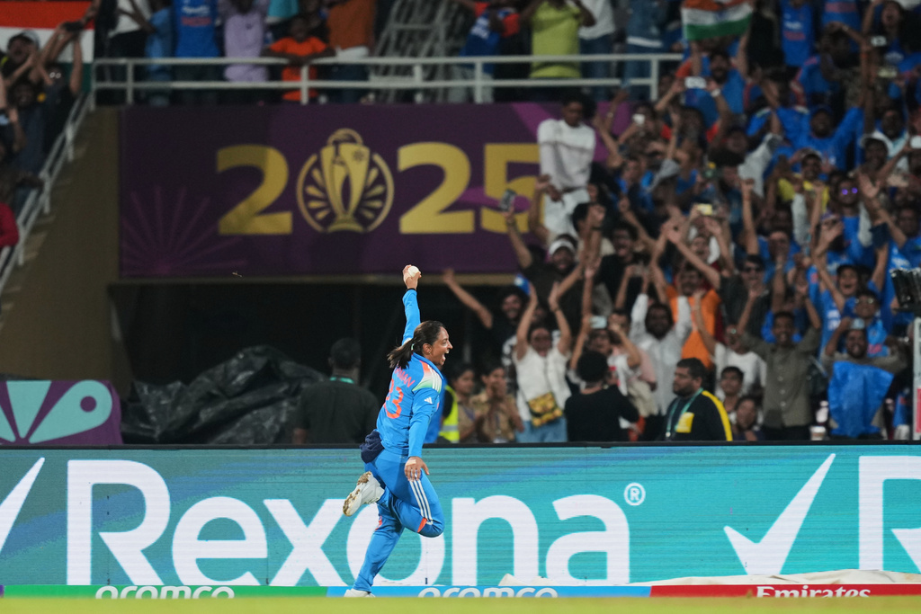 India's captain Harmanpreet Kaur celebrate with teammates after winning the ICC Women's Cricket World Cup final match between India and South Africa in Navi Mumbai, India, Sunday, Nov. 2, 2025. (AP Photo/Rafiq Maqbool)