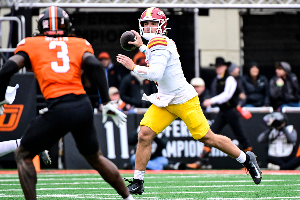 Iowa State quarterback Rocco Becht (3) looks to pass against Oklahoma State during the first half of an NCAA college football game, Saturday, Nov. 29, 2025, in Stillwater, Okla. (AP Photo/Gerald Leong)