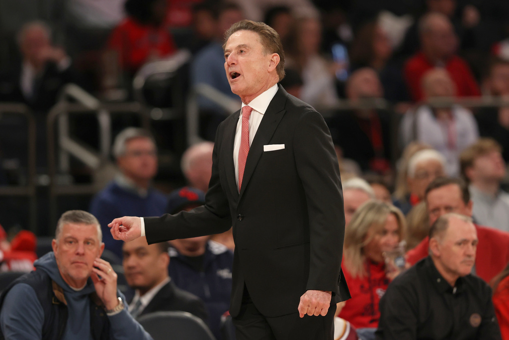 St. John's head coach Rick Pitino yells during the first half of an NCAA college basketball game against Iona, Saturday, Dec. 13, 2025, in New York. (AP Photo/Pamela Smith)