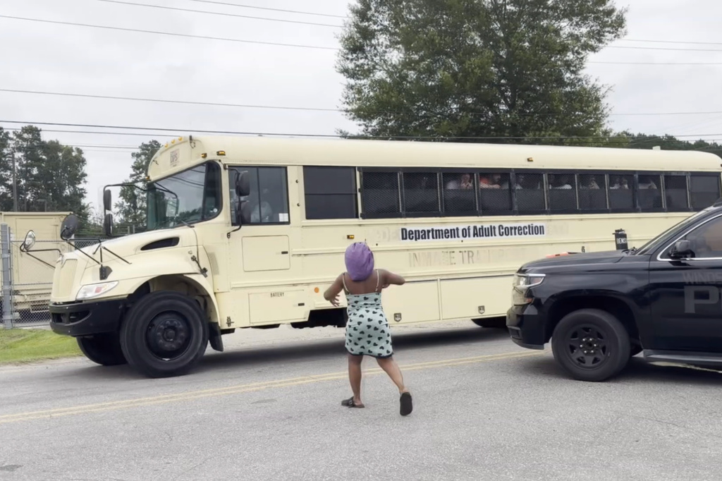 An inmate transport bus is seen near the Bertie-Martin Regional Detention Center that was partly taken over on Monday, June 29, 2026, Windsor, Bertie County, N.C. (WITN via AP)