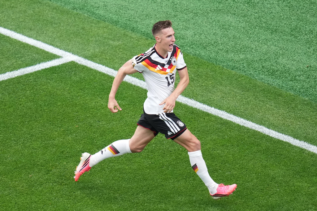Germany's Nico Schlotterbeck (15) celebrates after scoring his side's second goal during the World Cup Group E soccer match between Germany and Curacao in Houston, Sunday, June 14, 2026. (AP Photo/Eric Smith)