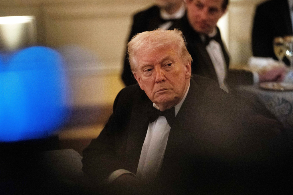 President Donald Trump attends the National Governors Association dinner at the White House, Saturday, Feb. 21, 2026, in Washington. (AP Photo/Allison Robbert)