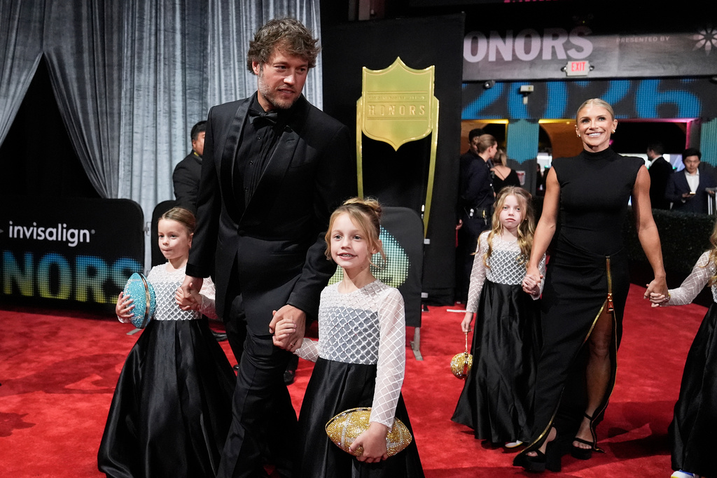 Los Angeles Rams' Matthew Stafford, top left, and his wife, Kelly Stafford, arrive with their family for football's NFL Honors award show in San Francisco, Thursday, Feb. 5, 2026. (AP Photo/Brynn Anderson)