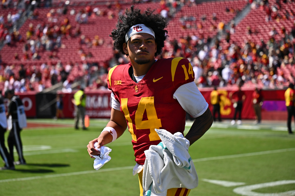 Southern California quarterback Jayden Maiava runs on the field after his team defeated San Jose State in an NCAA college football game, Saturday, Aug. 29, 2026, in Los Angeles. (AP Photo/William Liang)