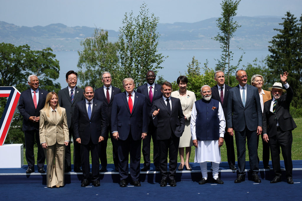 From left, European Council President Antonio Costa, Italian Prime Minister Giorgia Meloni, South Korea's President Lee Jae Myung, Egyptian President Abdel Fattah al-Sisi, British Prime Minister Keir Starmer, U.S. President Donald Trump, Kenya's President William Ruto, French President Emmanuel Macron, Japanese Prime Minister Sanae Takaichi, India's Prime Minister Narendra Modi, Canadian Prime Minister Mark Carney, German Chancellor Friedrich Merz, European Commission President Ursula von der Leyen, Brazilian President Luiz Inacio Lula da Silva gather for a group photo at the G7 summit in Evian-les-Bains, France, Tuesday June 16, 2026. (Isabel Infantes/Pool Photo via AP)