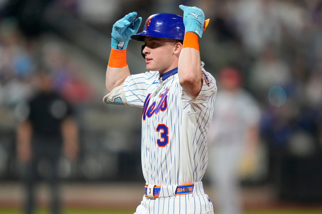 New York Mets' Carson Benge (3) reacts after hitting an RBI single during the fifth inning of a baseball game against the Cincinnati Reds , Wednesday, May 27, 2026, in New York. (AP Photo/Yuki Iwamura)