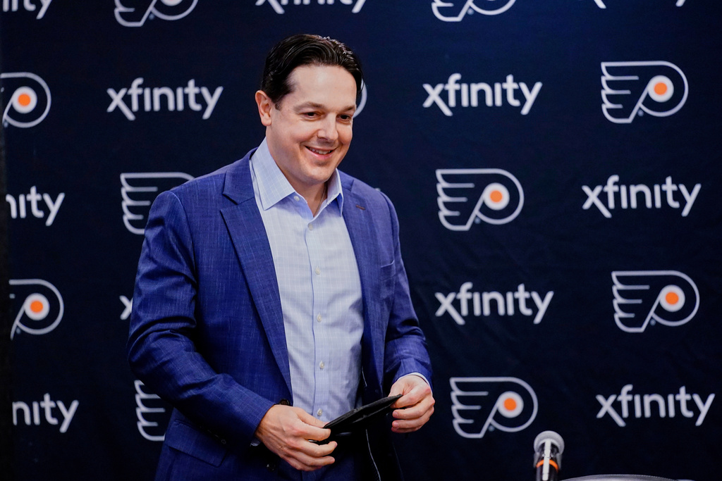 FILE - Philadelphia Flyers NHL hockey team Special Assistant to the General Manager Daniel Briere arrives for a news conference in Philadelphia, Wednesday, Feb. 9, 2022. (AP Photo/Matt Rourke, File)