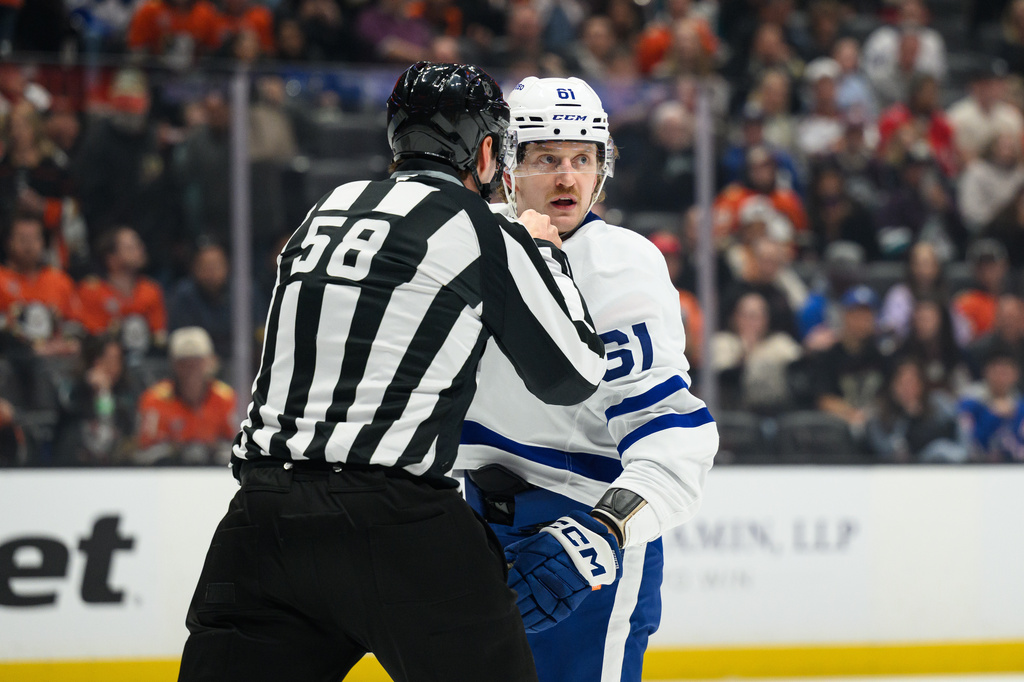 Toronto Maple Leafs left wing Michael Pezzetta (61) receives a game misconduct and is ejected during the second period of an NHL hockey game against the Anaheim Ducks, Monday, March 30, 2026, in Anaheim, Calif. (AP Photo/William Liang)