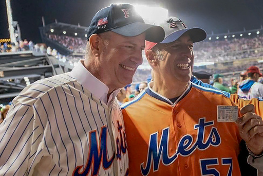 In this undated image, former New York City Mayor Bill de Blasio, left, poses for a photo with Bill DeBlasio, a wine importer from Long Island, at a New York Mets baseball game in New York. (William W. DeBlasio via AP) In this undated image, former New York City Mayor Bill de Blasio, left, poses for a photo with Bill DeBlasio, a wine importer from Long Island, at a New York Mets baseball game in New York. (William W. DeBlasio via AP)