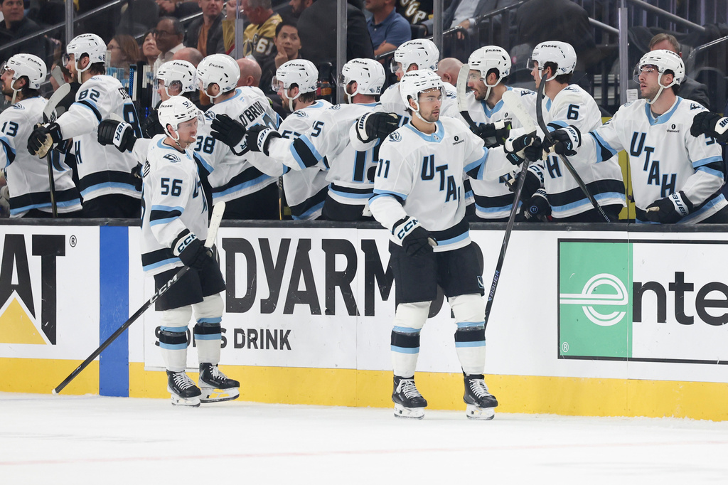 Utah Mammoth right wing Dylan Guenther (11), reacts after his goal against the Vegas Golden Knights during the second period in Game 2 of a first-round NHL hockey Stanley Cup playoff series Tuesday, April 21, 2026, in Las Vegas. (AP Photo/Ian Maule)