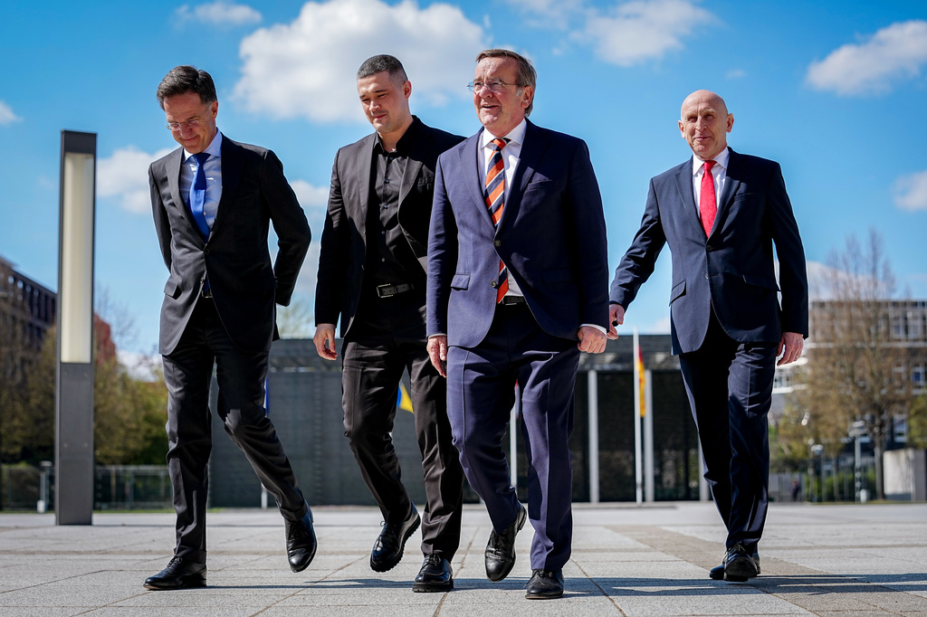 From left, Secretary General of NATO Mark Rutte, Ukraine's Minister of Defense Mykhailo Fedorov, Germany's Minister of Defense Boris Pistorius and Britain's Secretary of Defense John Healey gather for a photo at the Ukraine Contact Group meeting in front of the Federal Ministry of Defense in Berlin, Wednesday April 15, 2026. (Kay Nietfeld/dpa via AP)