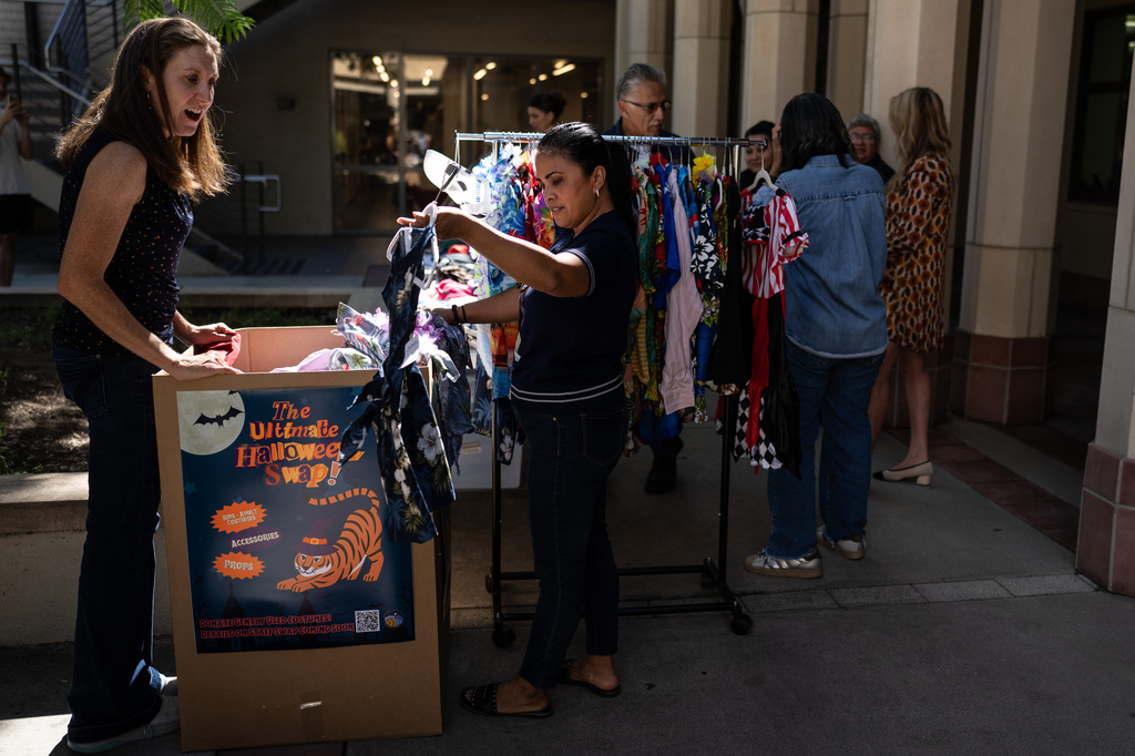 People gather at a Halloween costume swap at Occidental College in Los Angeles, Friday, Oct. 16, 2026. (AP Photo/Jae C. Hong)