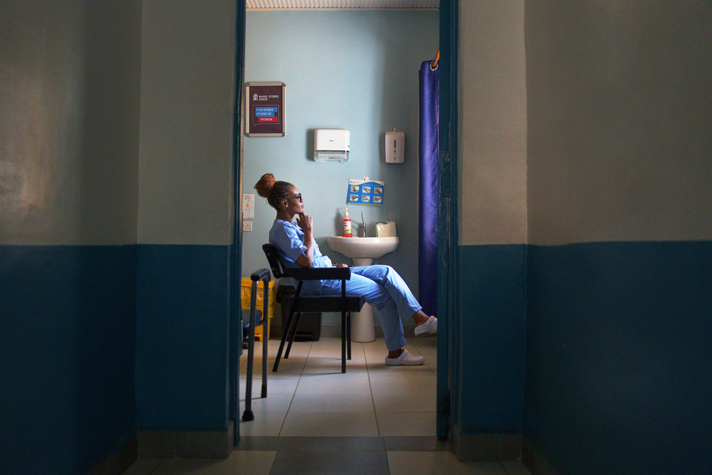 Hannah Ruguru, a health worker at Marie Stopes clinic, sits in a consultation room in Kisumu, Kenya, July 18, 2025. (AP Photo/Annie Risemberg)