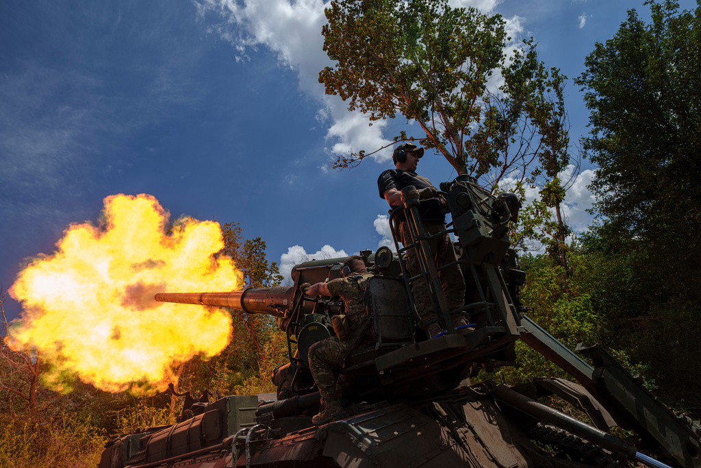FILE - Ukrainian soldiers, of 43rd artillery brigade, fire by 2s7 self-propelled howitzer towards Russian positions at the frontline in Donetsk region, Ukraine, June 24, 2024. (AP Photo/Evgeniy Maloletka, File)