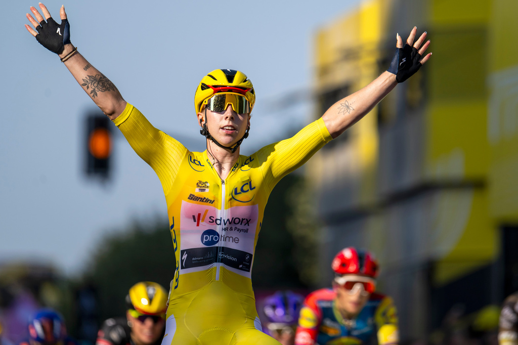 Netherlands' Lorena Wiebes of team SD Worx Protime celebrates crossing the finish line to win the second stage a 149 km from Aigle to Geneva during the Women's Tour de France (Tour de France Femmes), in Geneva, Switzerland, Sunday, Aug. 2, 2026. (Jean-Christophe Bott/Keystone via AP)