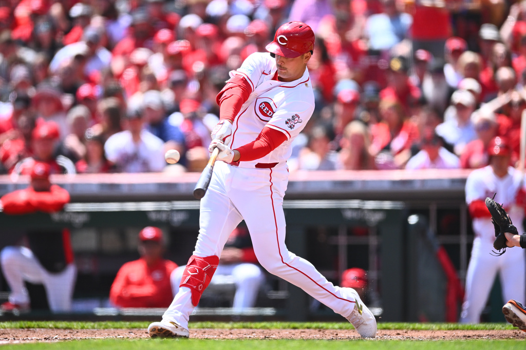 Cincinnati Reds' Nathaniel Lowe hits a solo home run during the second inning of a baseball game against the Detroit Tigers in Cincinnati, Sunday, April 26, 2026. (AP Photo/Ben Jackson)