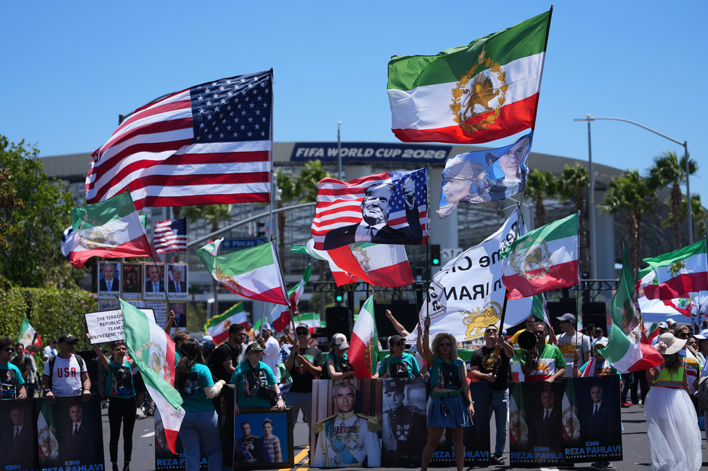 People protest outside Los Angeles Stadium before the World Cup Group G soccer match between Iran and New Zealand in Inglewood, Calif., near Los Angeles, Monday, June 15, 2026. (AP Photo/Jae C. Hong)