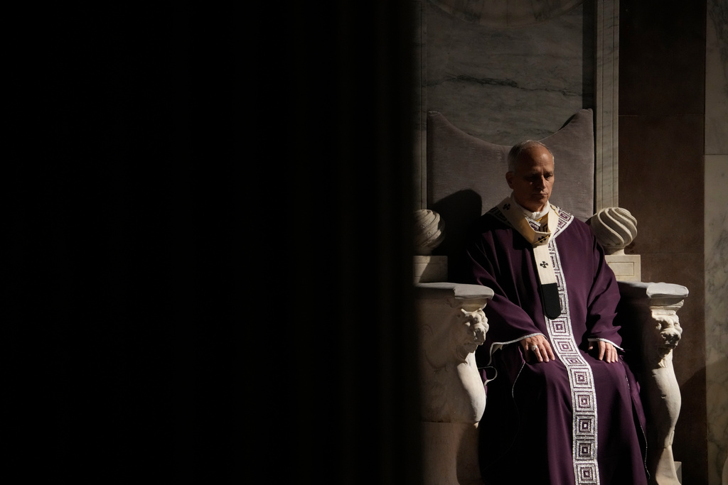 Pope Leo XIV presides over Ash Wednesday Mass, marking the start of the Catholic Lent, inside the Basilica of Santa Sabina in Rome, Wednesday, Feb. 18, 2026. (AP Photo/Gregorio Borgia)