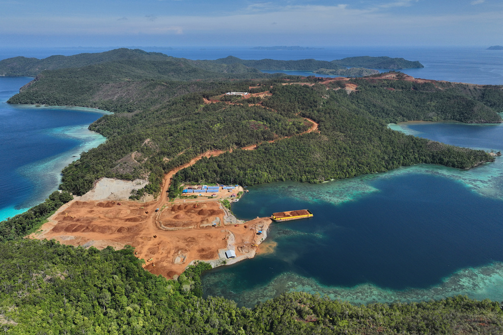 In this image provided by Auriga Nusantara, deforested land is visible where nickel mining takes place on Kawe Island, Indonesia, Dec. 21, 2024. (Auriga Nusantara via AP)